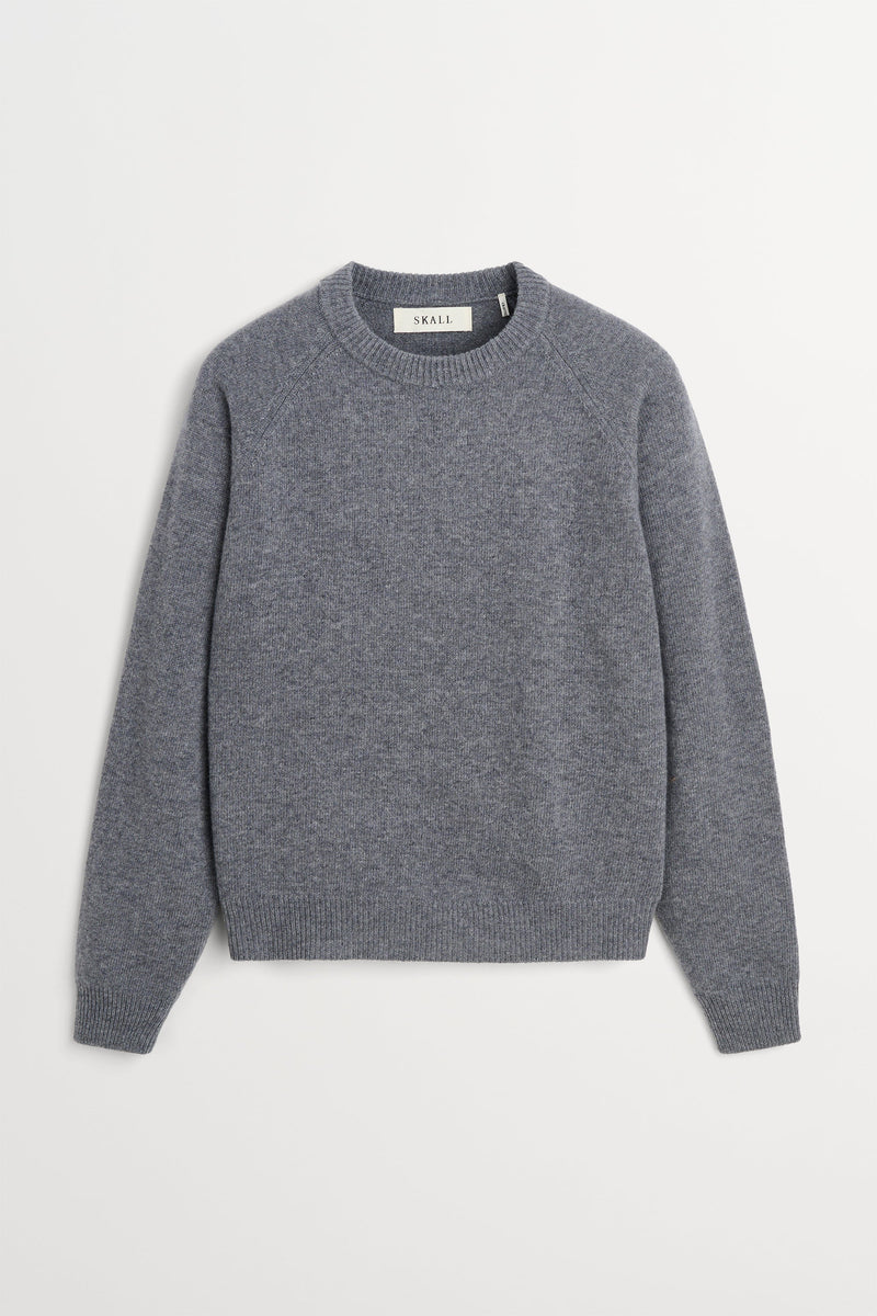 Skall Studio Drew O-neck strik i stone mélange merinould